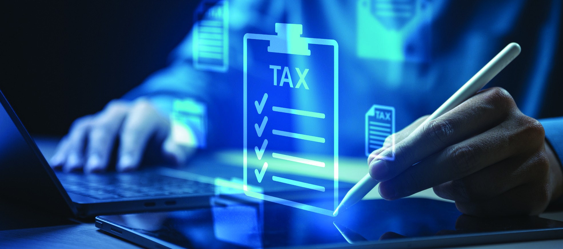 A digital tax document above a laptop keyboard